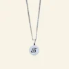 Ketting met letter Titanium ronde hanger laten graveren zilver kleurig S, J ,M of I