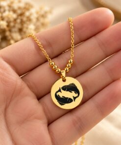 Necklace with engraved titanium zodiac pendant
